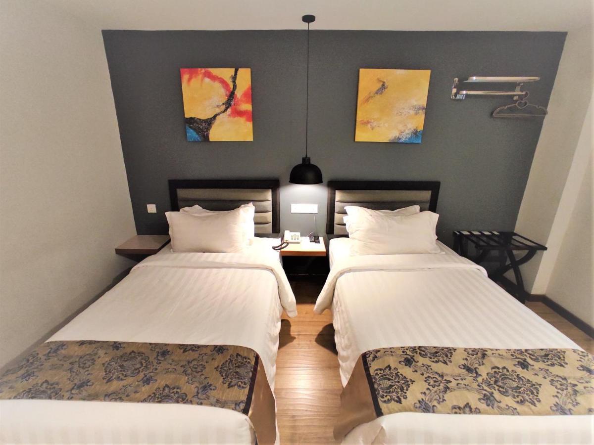 Apple Suites Hotel Sitiawan Bagian luar foto