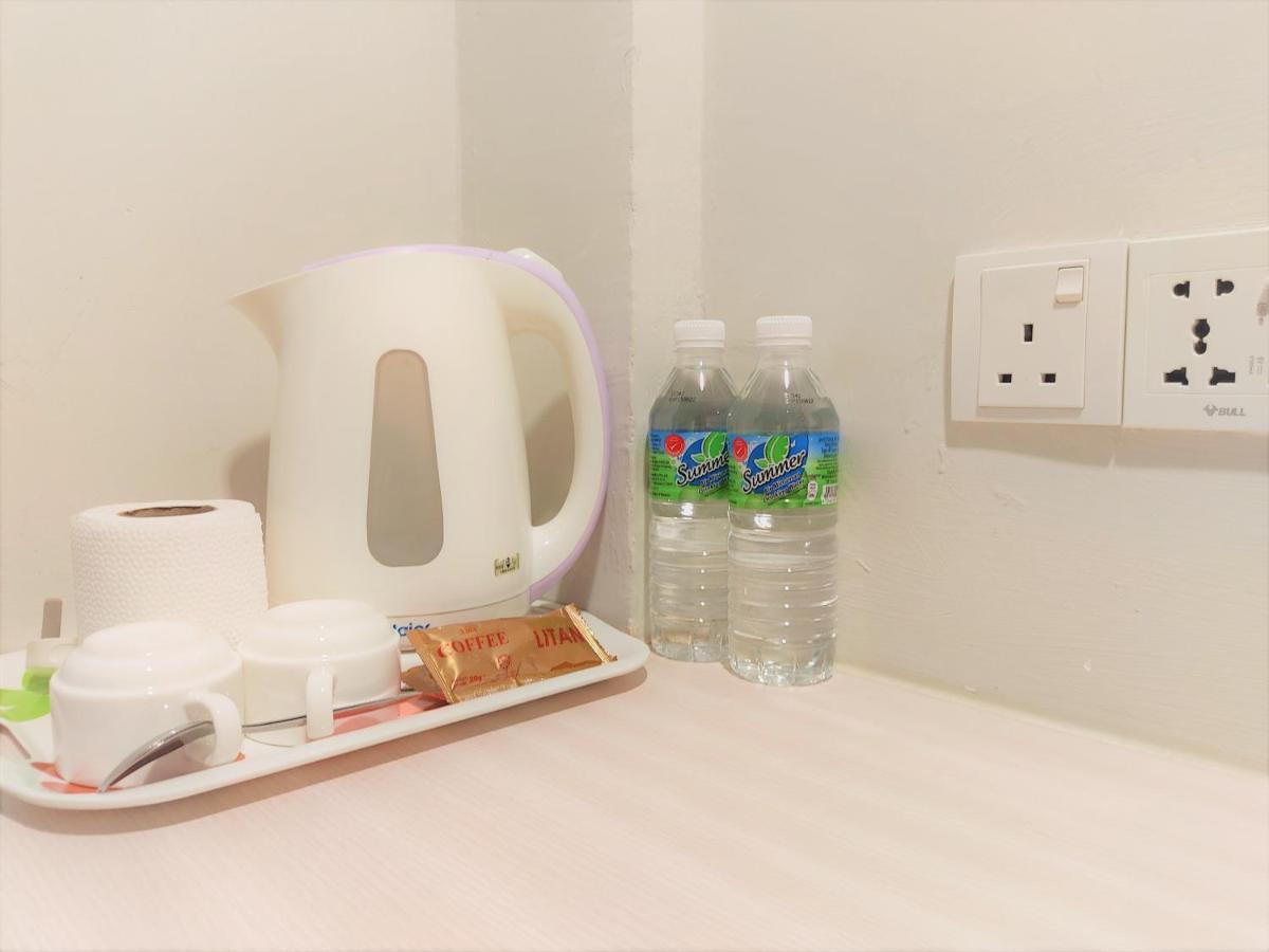 Apple Suites Hotel Sitiawan Bagian luar foto