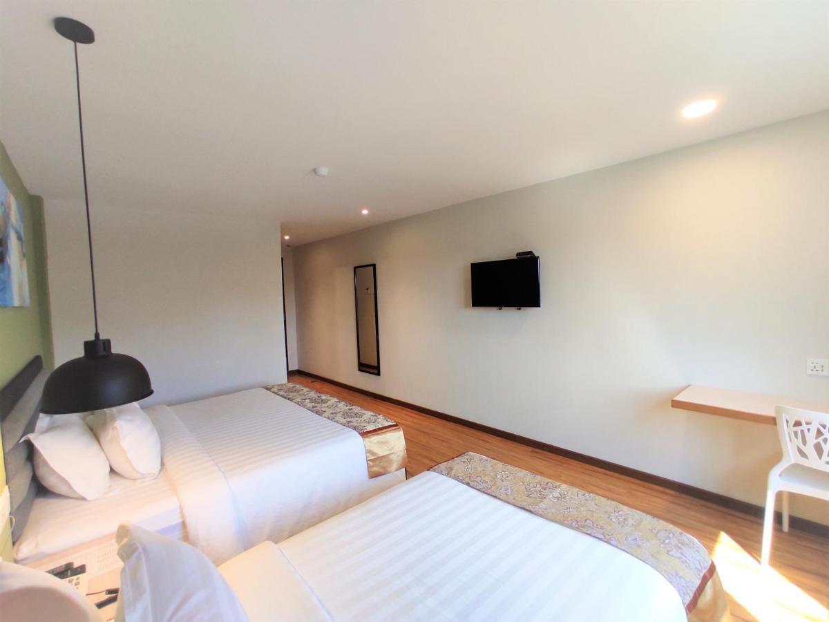 Apple Suites Hotel Sitiawan Bagian luar foto